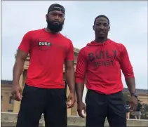  ?? SUBMITTED PHOTO ?? Clayton Kellum (right) and his cousin, Brandon Smith, attend a fitness event at the Philadelph­ia Museum of Art.