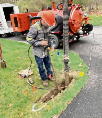  ?? Provided photo ?? A Greenlight Networks cable company employee puts fiber optic cable in the ground.