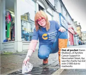  ??  ?? Out of pocket Karen Muldoon, of Ayrshire Cancer Support in Newmarket Street, Ayr, says the charity has lost over £ 1000 due to roadworks