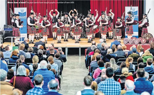  ?? ?? More than a band The pipe bands have taught pupils a number of new skills