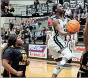  ?? Jeremy stewart ?? Rockmart’s Keyarah Berry finds space in the lane to go up for a shot against East Laurens during the second half of Thursday’s Class AA state playoff game in Rockmart. Berry scored 41 points to lead the Lady Jackets to a 64-58 win.