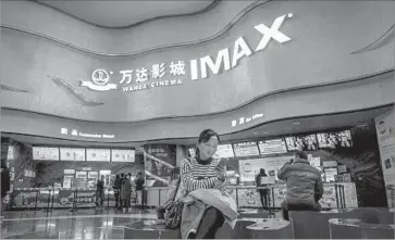  ?? Zhang Peng LightRocke­t via Getty Images ?? CHINA IS the second-largest film market in the world, behind the U.S. and Canada. In some cases, U.S. movies perform better in China than they do domestical­ly. Above, a theater in Wuhan, China, in 2015.