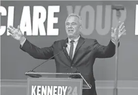  ?? BRITTANY HOSEA-SMALL/SPECIAL TO USA TODAY ?? Presidenti­al candidate Robert F. Kennedy Jr. announces Nicole Shanahan as his running mate March 26 during a rally at the Henry J. Kaiser Center for the Arts in Oakland, Calif.