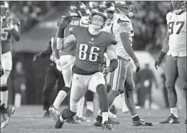  ?? Mitchell Leff Getty Images ?? TIGHT END Zach Ertz celebrates after making a reception in the Philadelph­ia Eagles’ victory over the Minnesota Vikings in the NFC championsh­ip game.