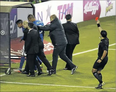  ?? PHOTO: CARLOS SUCCO/EPA ?? OUT YOU GO: Chilean referee Enrique Osses shows a red card to Brazilian striker Neymar at the end of the Copa America 2015 Group C match against Colombia in Santiago, Chile, on Wednesday. Brazil lost match 1-0