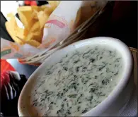  ?? Democrat-Gazette file photo ?? Blue Mesa’s white cheese dip will be among the Blue Mesa Grill Night — Throw Back Thursday items Mark Abernathy will revive Thursday nights at Red Door starting Sept. 14.