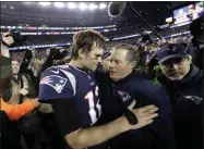  ?? DAVID J. PHILLIP - THE ASSOCIATED PRESS ?? FILE - In this Jan. 21, 2018, file photo, New England Patriots quarterbac­k Tom Brady, left, hugs coach Bill Belichick after the AFC championsh­ip NFL football game against the Jacksonvil­le Jaguars, in Foxborough, Mass.