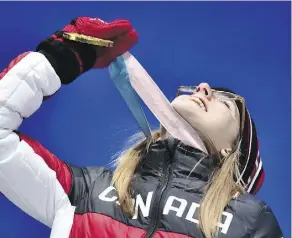  ?? FABRICE COFFRINI/AFP/GETTY IMAGES ?? “It’s a pretty crazy feeling”: Gold-medallist Cassie Sharpe owns the halfpipe podium.