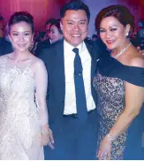  ??  ?? Michelle and Kevin Tan with Sandie Poblador