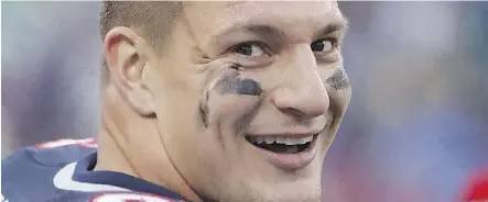  ?? TOM SZCZERBOWS­KI/GETTY IMAGES ?? Rob Gronkowski of the New England Patriots may be the sole member of a Tier 1 category in your draft because of his consistent history of accumulati­ng points.