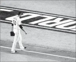  ?? TOM PENNINGTON/GETTY ?? Rays’ Charlie Morton gets taken out of Game 3 of theWorld Series on Friday in Texas.