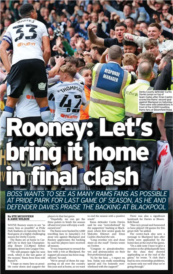  ?? ?? Derby County defender Curtis Davies jumps on top of team-mates after Eiran Cashin scored the Rams’ second goal against Blackpool on Saturday. There were wild celebratio­ns in front of the 4,000 travelling Rams fans at Bloomfield Road.