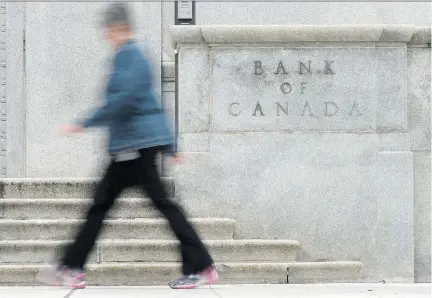  ?? ADRIAN WYLD/THE CANADIAN PRESS FILES ?? Canada’s big banks are warning against overplayin­g concerns about the country’s record debt levels. They say the economy won’t be derailed for numerous reasons, including the view the Bank of Canada won’t hike rates if signs of stress emerge.