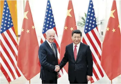  ?? Lintao Zhang / AFP ?? Biden i Xi Jinping, en una trobada institucio­nal el desembre del 2013.