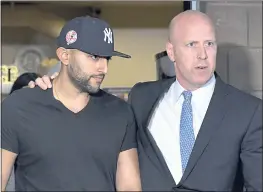  ?? HANS PENNINK — THE ASSOCIATED PRESS ?? Limousine service operator Nauman Hussain, left, leaves court with his attorney Lee Kindlon after being charged with criminally negligent homicide Wednesday in Cobleskill, N.Y.