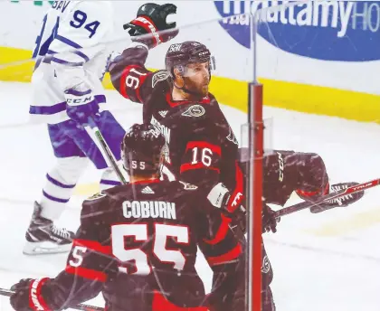  ?? ERROL MCGIHON ?? Senators winger Austin Watson celebrates after scoring a goal in Ottawa's season-opening 5-3 win over the Maple Leafs on Friday night in the nation's capital. The young Senators exploded for three goals in less than five minutes to take control of the match in the second period.