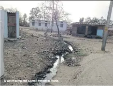  ??  ?? A water pump and a small stream in Ataria.