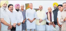  ?? HT PHOTO ?? (From left) Former Congress ministers Balbir Sidhu, Raj Kumar Verka, Gurpreet Singh Kangar and (second from right) Sundar Sham Arora after joining the BJP in presence of Union minister Amit Shah in Chandigarh on Saturday.