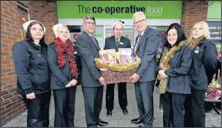  ??  ?? Pictured left to right Lorraine Dunkley (supervisor), Fi Fletcher (sales assistant), Ali Kurji (chief executive at Heart of England co-op), Mark Borrill (Store Manager), Peter Fletcher (general manager for food), Hayley Langdale (supervisor), Emma...