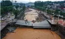  ?? Getty Images ?? A damaged bridge following heavy rains which caused severe flooding in Gongyi in China’s Henan province. Photograph: AFP/