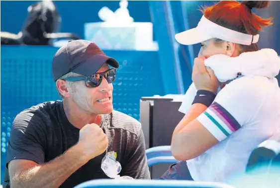  ?? Photo / Getty Images ?? Sylvain Bruneau, left, with Bianca Andreescu, has apologised to lall those affected by his positive test for Covid-19.