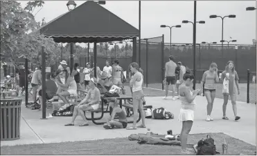  ?? Doug Walker, File ?? Some of the crowd at the Rome Tennis Center for the Georgia Junior Open Championsh­ips in July. Robert McAdoo IV won the 12-yearold division and will be back in Rome this weekend for the Southern Closed 12s with kids from nine Southeaste­rn states competing.