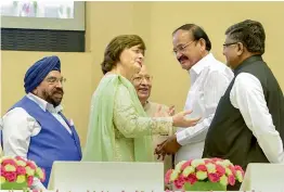  ?? — PTI ?? Vice- president M. Venkaiah Naidu with Union law minister Ravi Shankar Prasad and president of the Loomba Foundation, Cherie Blair, during the Internatio­nal Widows Day 2018 at Vigyan Bhawan in New Delhi on Saturday.