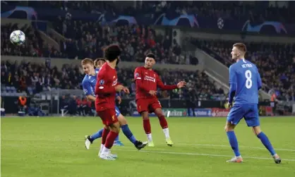  ??  ?? Alex Oxlade-Chamberlai­n scores his and Liverpool’s second goal with a shot from outside the area with the outside of his right foot. Photograph: Marc Atkins/Getty Images