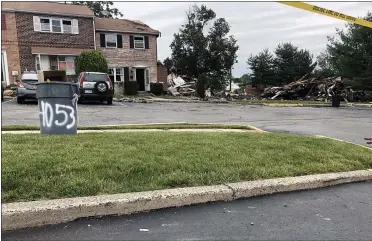  ?? RACHEL RAVINA - MEDIANEWS GROUP ?? Caution tape blocks off a portion of a residentia­l townhome community in Eagleville impacted by a fire on Thursday. The incident stemmed from a situation involving a resident and Lower Providence Township code enforcemen­t officer.