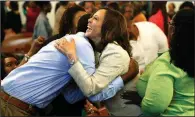  ?? (AP/John Locher) ?? Sen. Kamala Harris (D-Calif.) meets people before a Corinthian Baptist Church service on Aug. 11, 2019, in Des Moines, Iowa. Harris, chosen Tuesday as Joe Biden’s running mate, attended services at a Black Baptist church and a Hindu temple growing up.