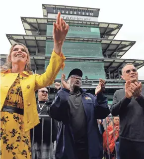  ?? AP ?? Savannah Guthrie, Al Roker and Tom Hanks listen as Sheryl Crow performs on NBC's “Today” show at the Indianapol­is Motor Speedway on Thursday.