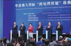  ?? WANG SHEN / XINHUA ?? Launch ceremony of the Cross-boundary Wealth Management Connect Pilot Scheme is held in Hong Kong on Friday.