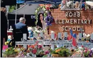  ?? Jae C. Hong | Ap/townnews.com Content Exchange ?? Texas Gov. Greg Abbott visits a memorial at Robb Elementary School in Uvalde, Texas, on May 29.