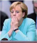  ??  ?? Conservati­ves blame Merkel’s pro-refugee stance for their election defeat.