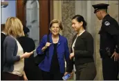  ?? JULIO CORTEZ — THE ASSOCIATED PRESS ?? Sen. Elizabeth Warren, D-Mass., arrives at the Capitol in Washington during the impeachmen­t trial on Saturday.