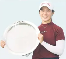  ?? Golf Australia — Photo courtesy of ?? Ashley poses with her Vic Open championsh­ip shield.