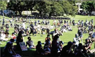  ?? AFP ?? Protesters gather at The Domain during an ‘Invasion Day’ demonstrat­ion on Australia Day in Sydney on Tuesday.