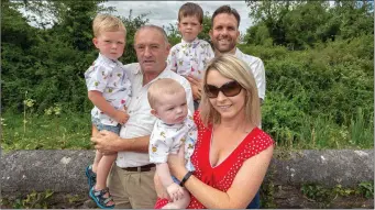  ??  ?? Pam and Billy Ahern, Toonsbridg­e, with Séamus (4), Liam (5 months) and granddad James O’Leary holding Ciarán (2) on a family day out at the Liz Lucey Memorial Run .