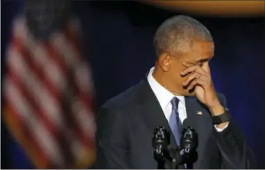  ?? THE ASSOCIATED PRESS ?? President Barack Obama wipes his tears as he speaks at McCormick Place in Chicago on Tuesday while giving his presidenti­al farewell address.