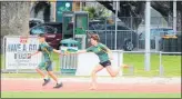  ??  ?? First runner Meghann Fraser hands over to Lucas Moka on the first change in the BOP Zone Athletics Championsh­ips relay.