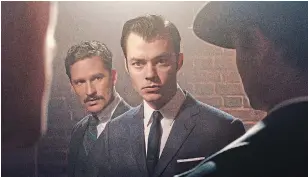  ?? ALEX BAILEY TRIBUNE NEWS SERVICE ?? Ben Aldridge (left) as Thomas Wayne, Bruce Wayne's father, and Jack Bannon as the young Alfred Pennyworth star in “Pennyworth”. Production work on a second season has halted due to the global pandemic.