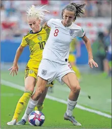  ?? [CLAUDE PARIS/THE ASSOCIATED PRESS] ?? Sweden’s Sofia Jakobsson, left, and England’s Jill Scott challenge for the ball during the third-place game Saturday in Nice, France.