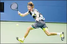  ??  ?? Andrey Rublev, of Russia, returns a shot to Daniil Medvedev, of Russia, during the quarter-finals of the US Open tennis championsh­ips on Sept 9
in New York. (AP)