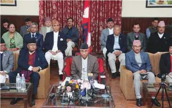  ?? AP ?? Nepalese Prime Minister Sher Bahadur Deuba announces his resignatio­n in Kathmandu, Nepal yesterday. His resignatio­n paves the way for a new government to take over power.