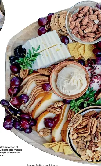  ?? UNSPLASH ?? A mix-and-match selection of nuts, cheeses, meats and fruits is a feast for the eyes as much as for the stomach.