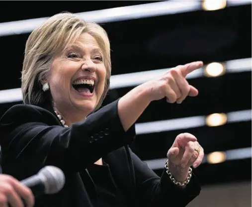  ??  ?? DES MOINES: Democratic presidenti­al candidate Hillary Clinton greets supporters at amore aggressive debate in Iowa on Saturday