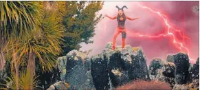  ??  ?? Isa Hackett as the Demoness, in a scene shot at Wairere Boulders, near Horeke.