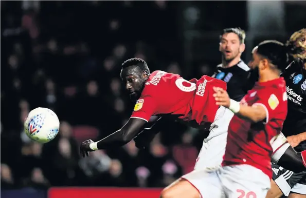  ??  ?? Bristol City striker Famara Diedhiou watches his header go wide during the defeat to Brimingham at Ashton Gate on Friday night