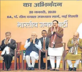  ?? SANJEEV VERMA/HT PHOTO ?? (From left) Senior BJP leader LK Advani, Prime Minister Narendra Modi, new BJP chief JP Nadda and Union home minister Amit Shah at the BJP headquarte­rs in New Delhi o n Monday.