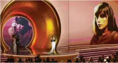  ?? Foto: Chris Pizzello, dpa ?? Taylor Swift bei der 66. Grammy-Verleihung.